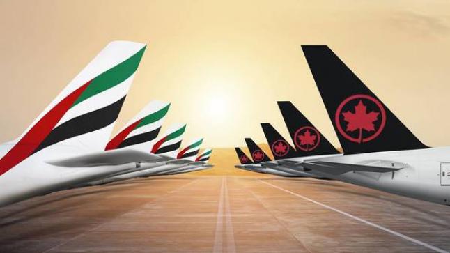 شراكة بين «طيران الإمارات» و«طيران كندا» لتبادل الرموز
