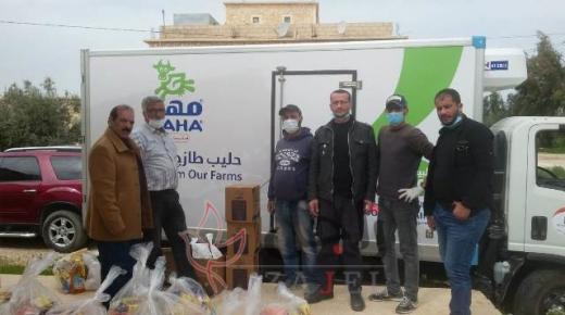 شركة الالبان الاردنية بالتعاون مع جمعية الكوم الأحمر للتنمية الاجتماعية توزع طرود غذائية  للأسر المحتاجة